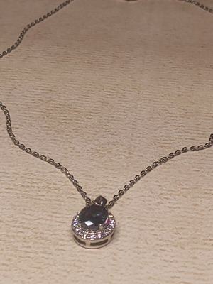 Women's necklace with dark gemstone pendant