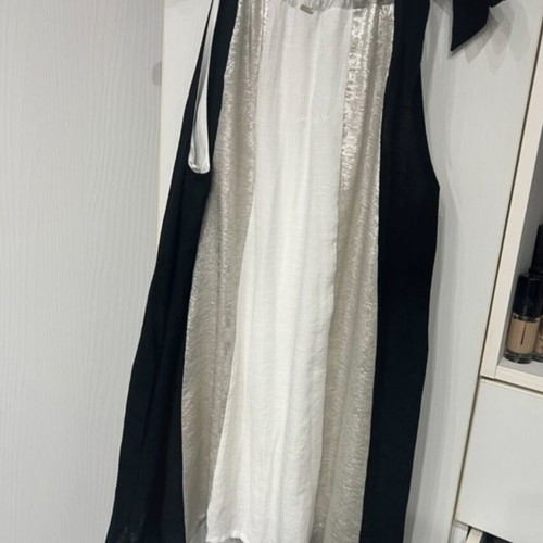 Bsb dress like new with adjustable neck ribbon, black and white