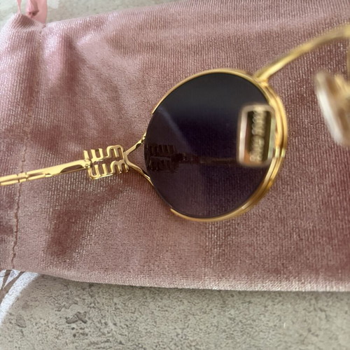 Miu Miu SMU52Y sunglasses like new, multicolor metal frame