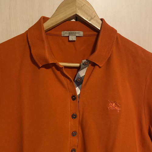 Burberry women's orange pique shirt like new