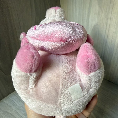 Small pink plush pig toy