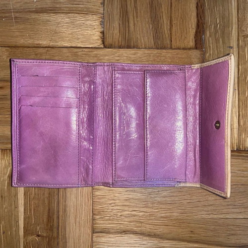 SaintClair leather wallet with wear on the back