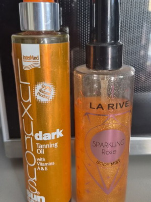 Sunscreen and body mist glitter like new, used together