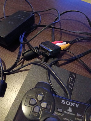 Sony PlayStation 2 console with memory card and remote