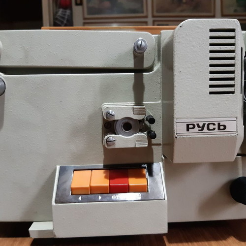 Pycb film projector used, with leather case and 3 children's cartoons