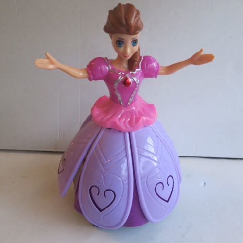 Disney Frozen Spinning Princess Anna 3D figure used, pink with light and music
