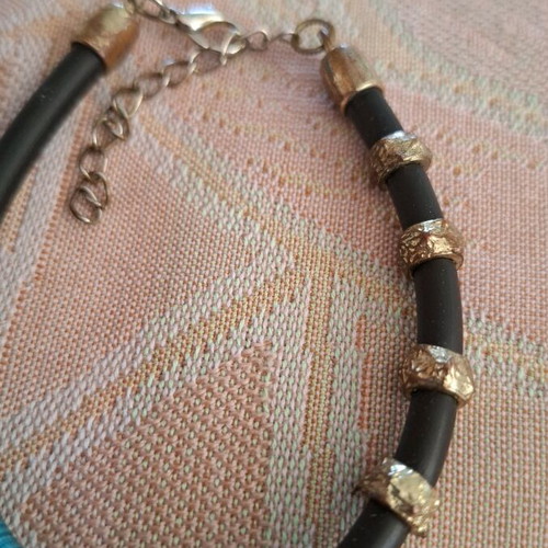 Women's bracelet used rubber with cross charm