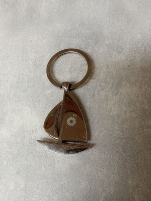 Keychain sailboat BP used, silver, 2000s decade