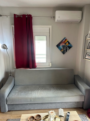 Καναπές-κρεβάτι μεταχειρισμένος 210cm με αποθηκευτικό χώρο γκρι