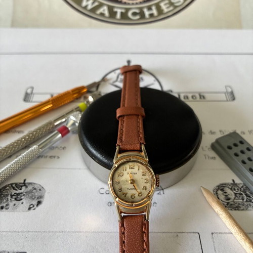 Jupiter women's watch used 1950s with leather strap gold tone