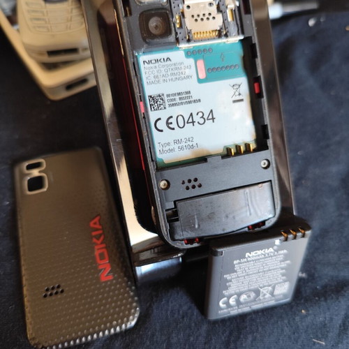 Nokia 5610 XpressMusic phone used with charger