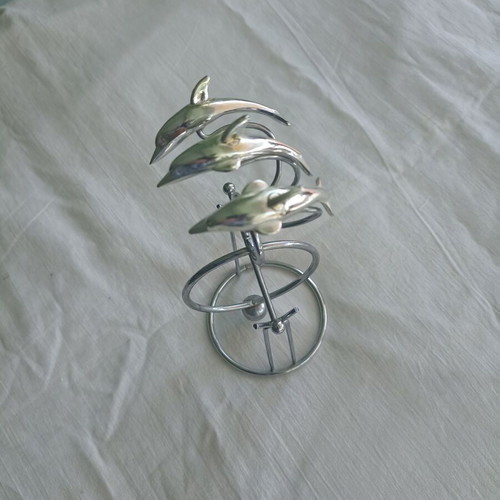Table decor with 3 dolphins used