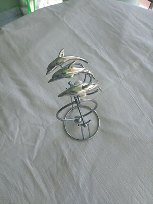 Table decor with 3 dolphins used