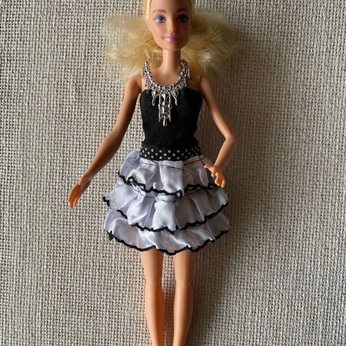 Collectible Barbie doll like new, well preserved and clean