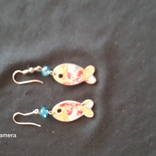 Earrings like new, uniquely painted on one side