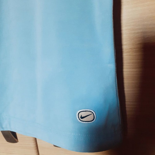 Nike women's turquoise shirt like new, size L/M