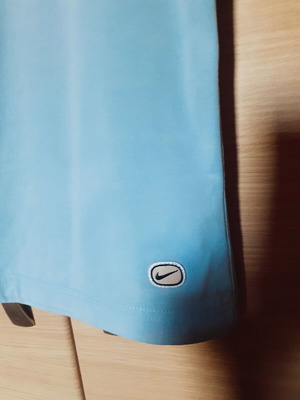 Nike women's turquoise shirt like new, size L/M