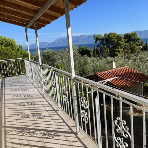 Detached house in Loukisia with sea view, garden and fireplace