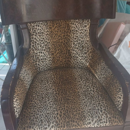 Classic wooden armchair with animal print upholstery, like new