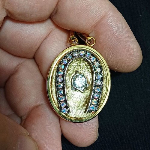 Pendant like new gold-tone horseshoe with zircon crystal