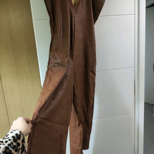 One-piece jumpsuit used, brown faux leather, one size