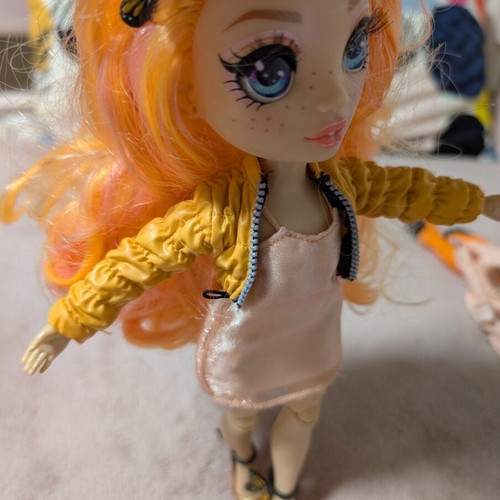 Rainbow High Poppy Rowan Fashion Doll with 2 Mix & Match Outfits, like new