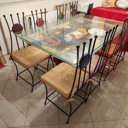 Glass dining table with 8 chairs like new