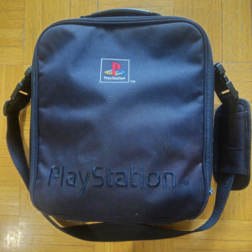 Sony PS One Slim console bundle with 2 controllers, official bag & 4 games