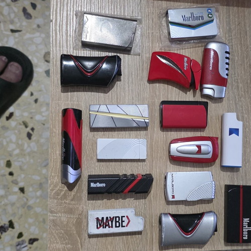 Collection of 45 advertising lighters with cigarette company logos