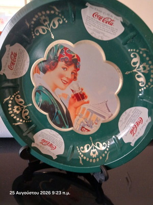 Coca-Cola metal collectible tray from the 90s