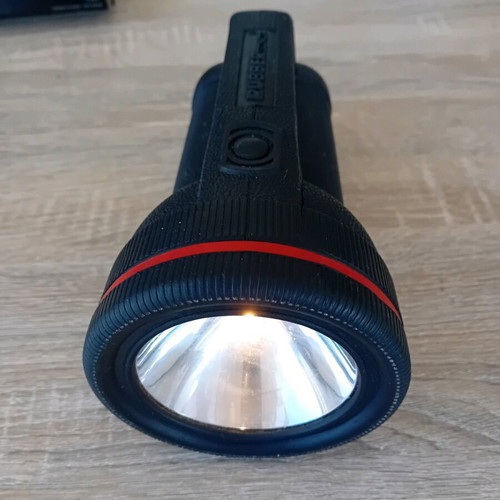 Handheld flashlight used