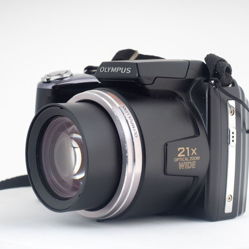 Olympus SP-620UZ Digital Bridge Camera used with slight battery door gap