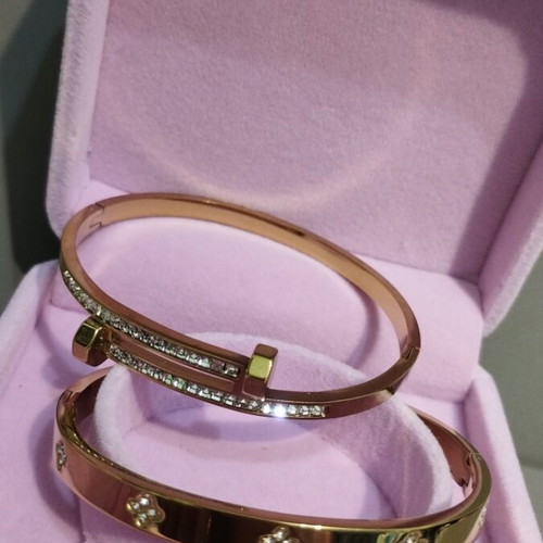 Hinged bracelet handcuffs new, gold-plated steel, set of 2