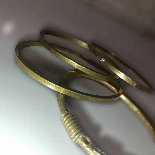 GOTI bracelet set used, 4 brass vintage bangles 1970s-1980s