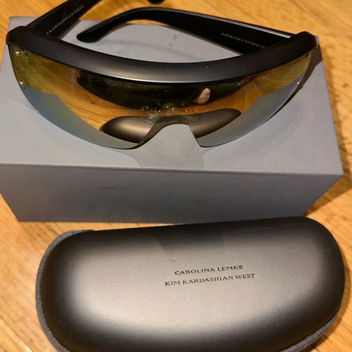 Sunglasses like new with extra box, case and cleaning cloth