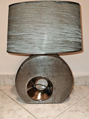 Table lamp used with silver shade