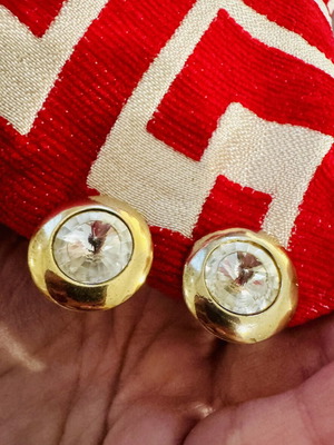 Vintage gold-plated clip-on earrings with large rhinestone