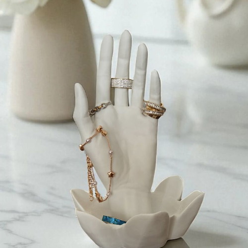 Decorative jewelry holder like new, white hand-shaped with lotus base