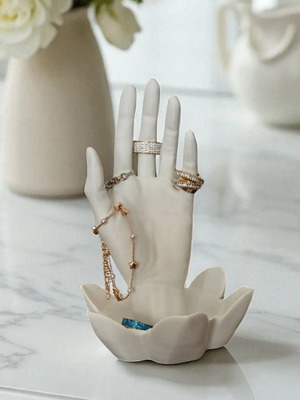 Decorative jewelry holder like new, white hand-shaped with lotus base
