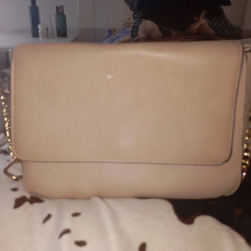 Vintage beige clutch bag used with gold chain details