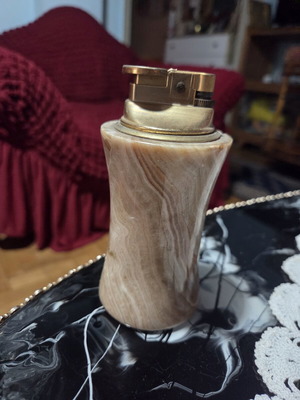 Lighter in marble pastel case, used, needs flint replacement
