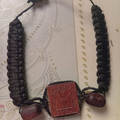 Christian bracelet with carved wood used