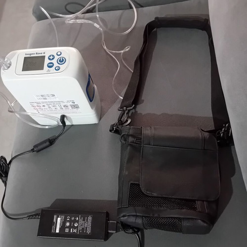 Portable Oxygen Concentrator like new with charger and carrying case
