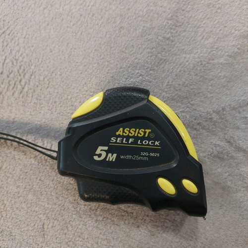 Measuring tape 5m x 25 mm used with defective large button