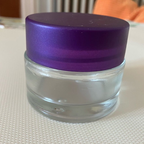 Empty 50 ml container made of thick glass, like new