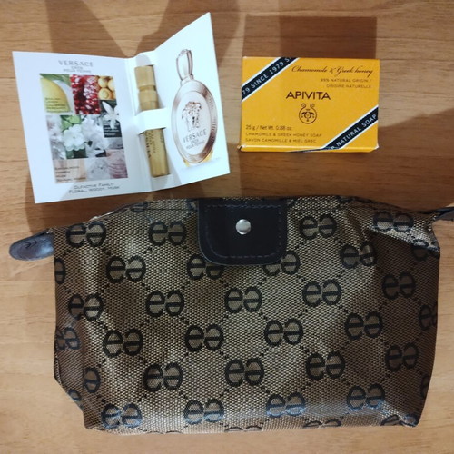 Mini toiletry set with brown-gold cosmetic bag, Apivita soap, Versace Eros Pour Femme sample