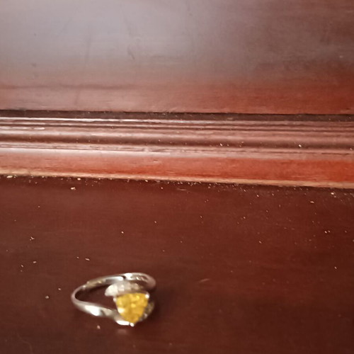 Silver ring like new with yellow stone, adjustable