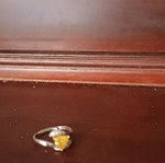 Silver ring like new with yellow stone, adjustable