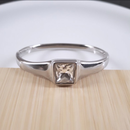 Steel bracelet with transparent stone, like new, silver color