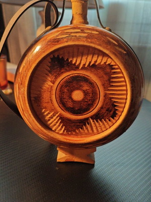 Wooden handmade flask used with leather strap